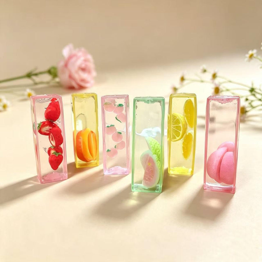 Fidget Toy Squishy, a viral TikTok stress-relieving toy, Jelly Vaseline Texture Fruit Series, Long Strip Strawberry Ice Cube, a quiet stress-relief hand toy, aesthetic desk decor, soft silicone hand toy.